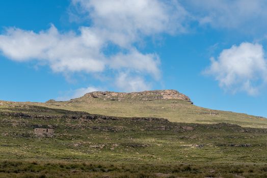 View to the South from the top of the Tugela Falls. The mountain hut and Crows Nest Cave are visible