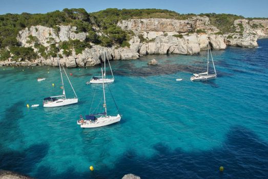 Sailboats waiting in the calm and blue sea, quiet