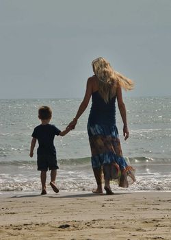 Mother and son love on the beach, Love of mother