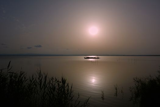 Reflections of the sunset in the lagoon