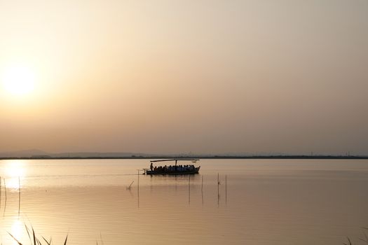 Reflections of the sunset in the lagoon. Sunset lights