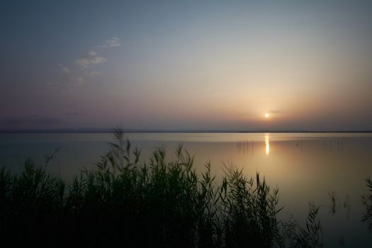 Reflections of the sunset in the lagoon