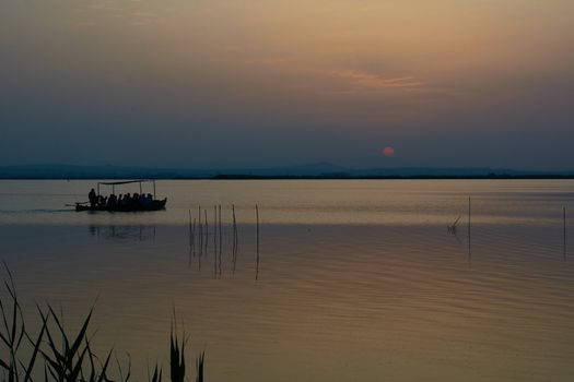 Reflections of the sunset in the lagoon.Sunset lights