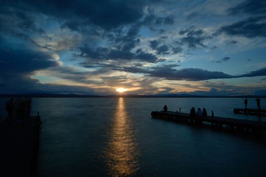 Spring sunset from the old wooden jetty. Sunset colors