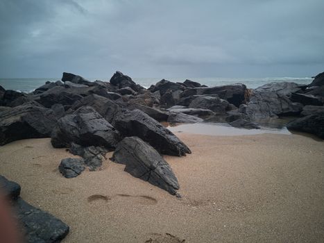 Rocks on the beach after the storm.Storm colors