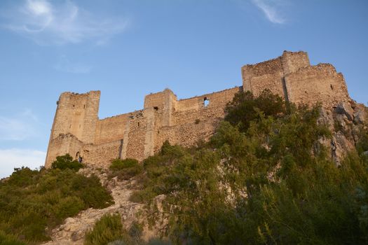 Majestic castle guarding the great mountain. Loneliness and tranquility