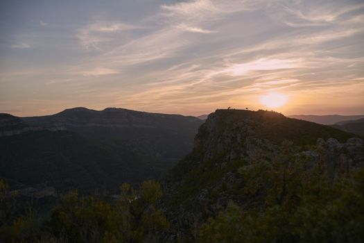 Sunset between the big mountains in summer, Sunset colors