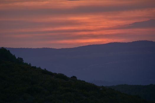 Sunset between the big mountains in summer, Sunset colors