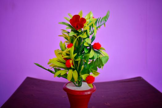 A colorful flower and leaf pot showpiece well decorated on a tool