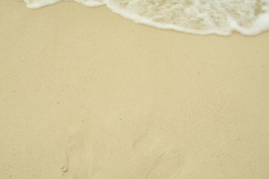 Small waves reaching the shore of the beach, Caribbean beach with turquoise waters