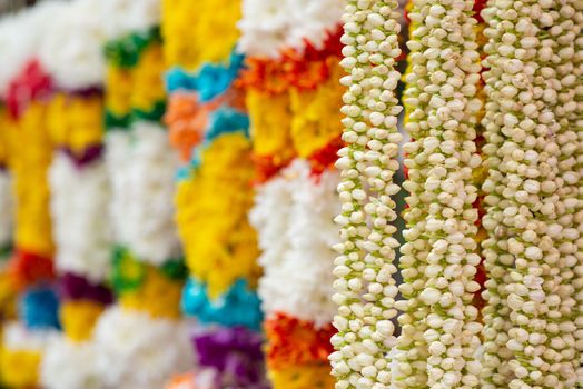 Indian colorful flower garlands for sales during diwali festival