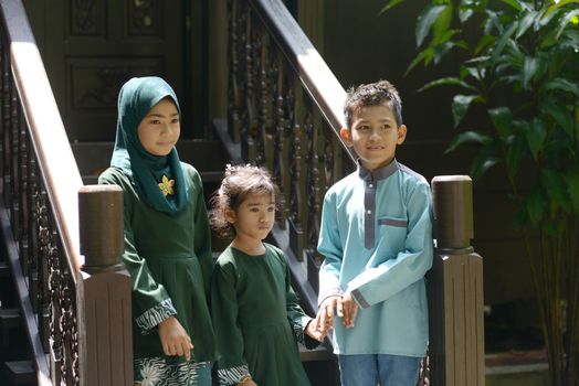 Muslim children portrait, Hari Raya Eid Al-Fitr concept. 