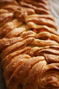 Meat pie with puff pastry. Beautiful golden crust. Crispy Tasty Lunch. vertical photo