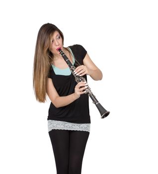 beautiful woman play clarinet on withe background 