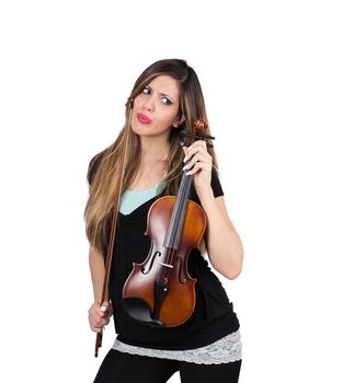 Beautiful puzzled student girl with her violin