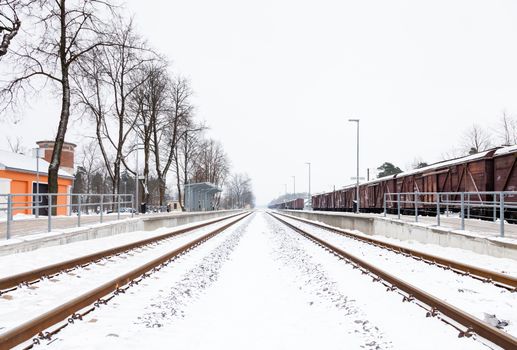 The view along a snow covered railway track in Sigulda, Latvia.