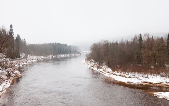 A winter view of the Gauja River near Sigulda, Latvia. Sigulda is a part of the Gauja National Park.