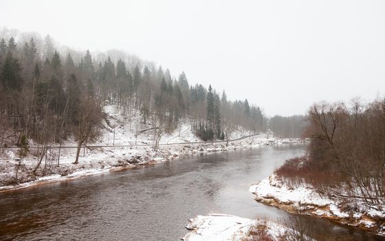 A winter view of the Gauja River near Sigulda, Latvia. Sigulda is a part of the Gauja National Park.