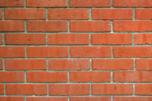 Red rough bricks wall texture, background
