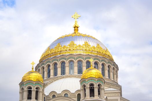 Nicholas the wonderworker's domes church on Anchor square in kronstadt town Saint Petersburg. Naval christian cathedral church in russia with golden dome, unesco architecture at sunny day