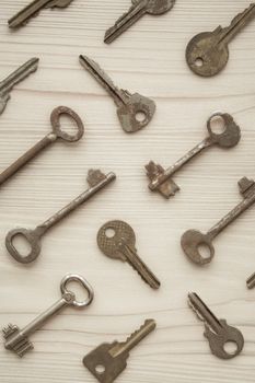 Top view of many old rusty keys background. Many keys Access, security, enter, choice, solutions of problems concept, symbol. Vertical