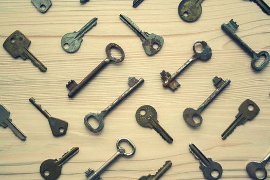 Top view of many old rusty keys background. Many keys Access, security, enter, choice, solutions of problems concept, symbol. toned