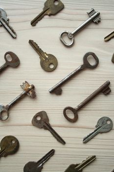 Top view of many old rusty keys background. Many keys Access, security, enter, choice, solutions of problems concept, symbol. Vertical