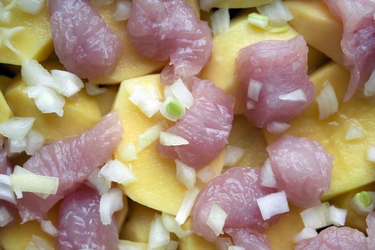 Top view of cutted raw slices of potato, meat and onion. Taste food photography, healthy food, natural 
