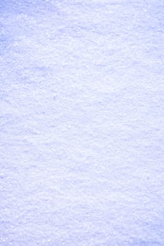 Snow surface background close up at sunny winter day