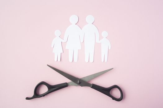 black scissor cutting family paper cut , dysfunctional family, bad children development, divorce parent broken family concept, mental health