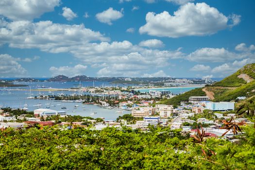 A view of bay on St Martin from hill over buildings on coast