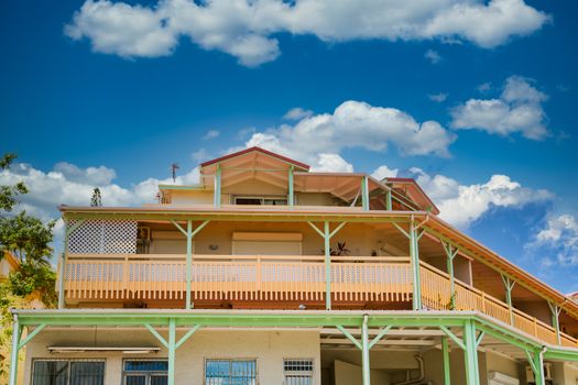 Brightly colored buildings under tropical skies