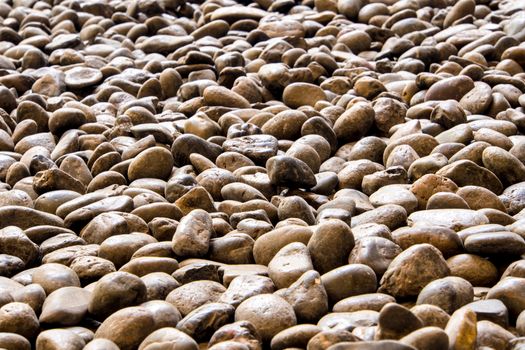 Texture of river stone in walkway 