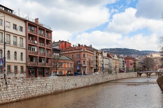 Sarajevo, Bosnia and Herzegovina - 27 February 2019: Obala Kulina bana, architecture of Sarajevo and Latin Bridge