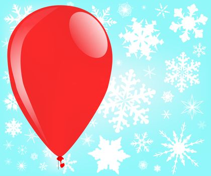 A large red balloon surounded with falling snowflakes