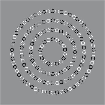 n optical illusion. Circles that appear to be spiraling.