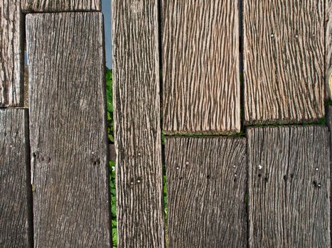 Grooves and patterns of the hardwood bridge across the canal