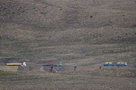 Lauca National Park. Arica y Parinacota Region. Chile. February 7, 2012: trucks on a road.