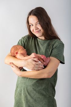 Mother and Baby kissing and hugging. Happy Family.