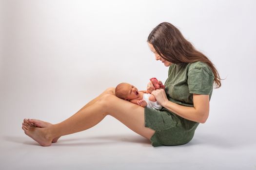 Mother and Baby kissing and hugging. Happy Family.