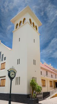 A street clock in front of an old church in Philipsburg, St Martin