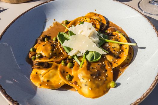 Rabbit ravioli with mushroom sauce and its rapeseed parmesan cheese on the island of Malta