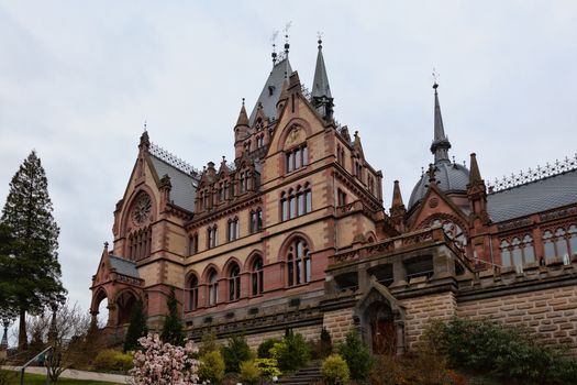 Konigswinter, Germany - 2 March 2019: Drachenburg castle on a gloomy day