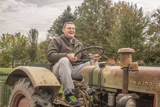 LENDINARA , ITALY 24 MARCH 2020: Happy Farmer at work