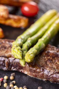 green asparagus on a steak