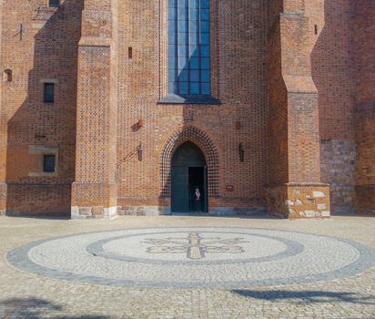 Entrance to huge brick cathedral