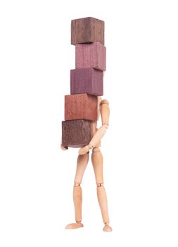 Wooden mannequin carrying wooden hardwood blocks, isolated on white