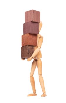Wooden mannequin carrying wooden hardwood blocks, isolated on white