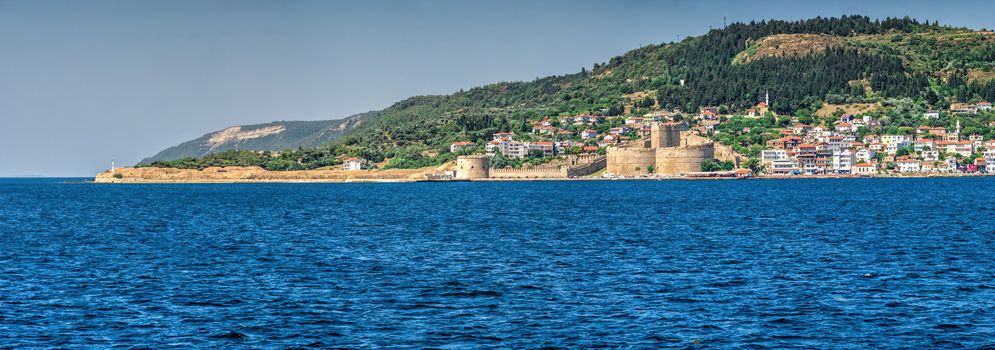 Canakkale, Turkey - 07.23.2019.  Kilitbahir castle and fortress on the west side of the Dardanelles opposite city of Canakkale in Turkey. Big size panoramic view on a sunny summer morning.