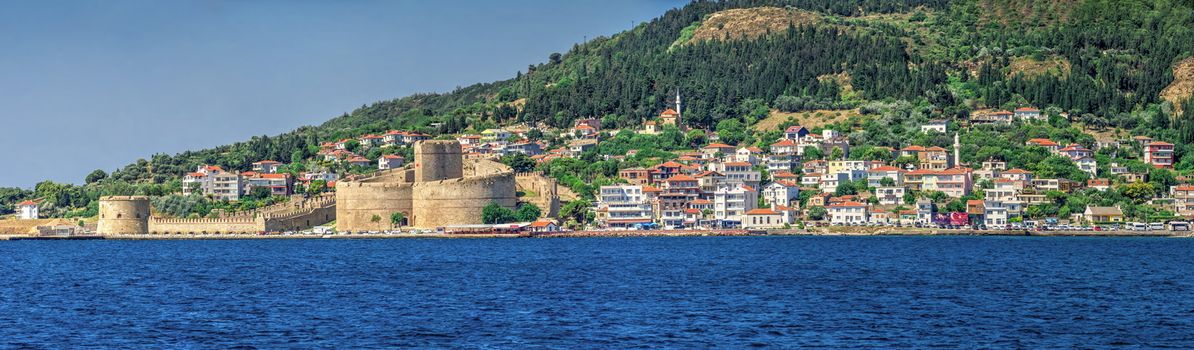 Canakkale, Turkey - 07.23.2019.  Kilitbahir castle and fortress on the west side of the Dardanelles opposite city of Canakkale in Turkey. Big size panoramic view on a sunny summer morning.